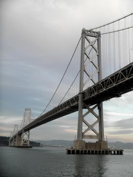 San Francisco side of Bay Bridge with Oakland in the distance.