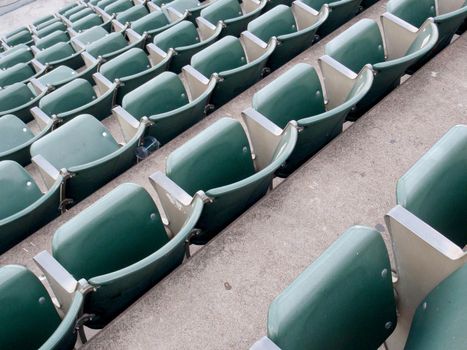 Oakland - September 21, 2010: Rows of empty green stadium seats looking downwards in Oakland, California.
