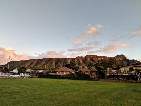 Paki Community Park at dusk with Diamond Head Crater in the background on Oahu, Hawaii.