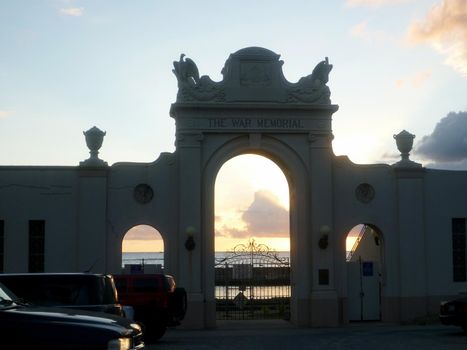 Waikiki -  September 20, 2014:  The Waikiki Natatorium War Memorial at sunset which is a war memorial in Honolulu, Hawaii, USA, built in the form of an ocean water public swimming pool. The natatorium was built as living memorial dedicated to "the men and women who served during the great war" (now known as World War I).