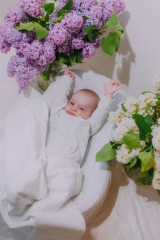 A baby with a teether on a white background . Teething. Children's article. Copy space