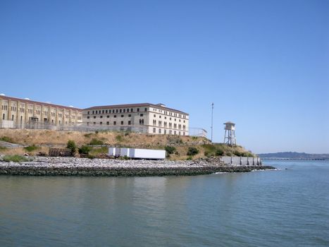 San Quentin State Prison California taken from a passing ferry.  With look out tower at center.