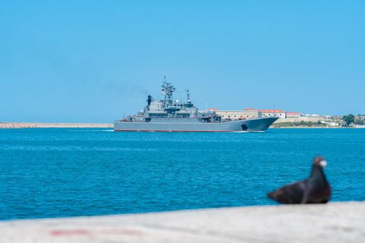 RUSSIA, CRIMEA - JUL 08, 2022: Russian sevastopol navy russia military group day sky city rehearsal, from black ship for fleet for armed force, transport defense. Destroyer gray,