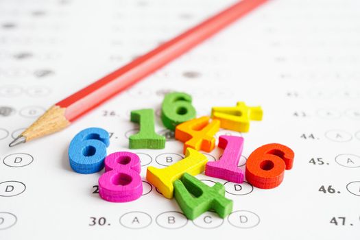 Math number with pencil on answer sheet test choice for learning Mathematic, education math concept.