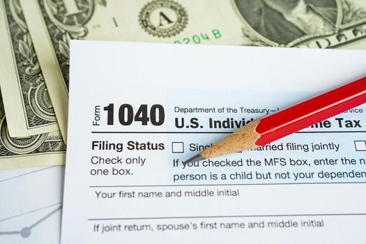 Tax form 1040 U.S. Individual Income Tax Return, business finance concept.