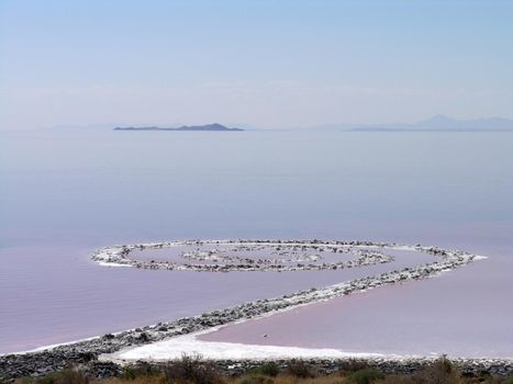 Utah - August 25, 2005: Spiral jetty seen from the rocky shore, Robert Smithson's masterpiece earthwork, on the north side of the Great Salt Lake, about two-and-a-half hours from Salt Lake City. 