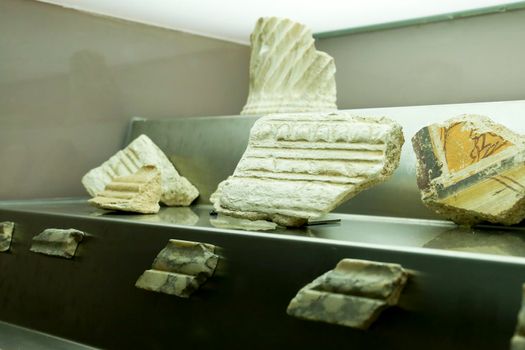Cartagena, Murcia, Spain- July 17, 2022: Fragments of cornices of the Temple dedicated to Octavian Augustus in Cartagena, Spain