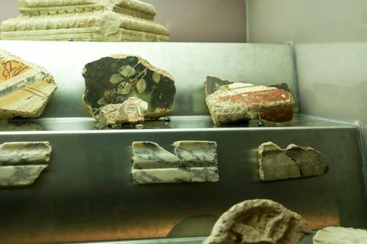 Cartagena, Murcia, Spain- July 18, 2022: Fragments of decorated cornices of the Temple dedicated to Octavian Augustus in Cartagena, Spain