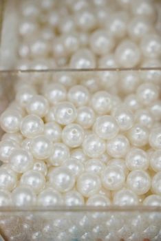 A variety of beads for necklaces and other jewelry.Various pearl beads close-up