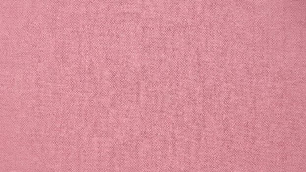 pink fabric texture for natural textile background.