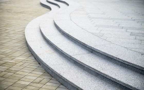 Curvilinear stairs. Top view of modern architecture detail. Refined fragment of contemporary office interior public building.