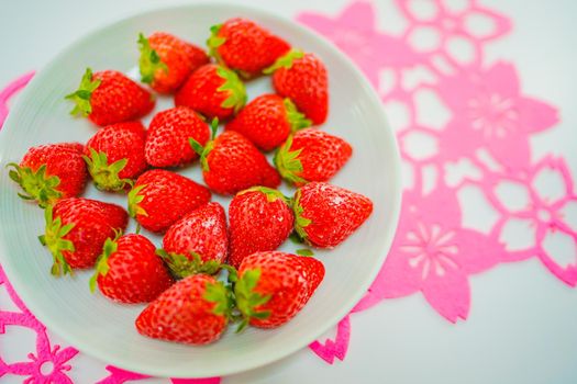 Frozen strawberries and white dishes. Shooting Location: Yokohama-city kanagawa prefecture