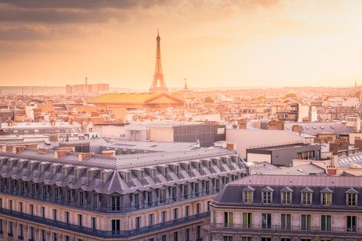 Eiffel tower view from Opera at dramatic sunset from above, Paris, France