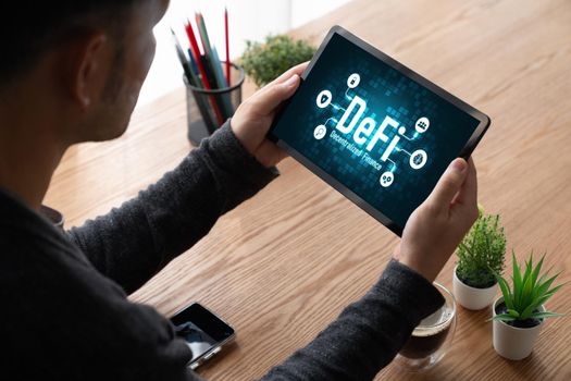 Decentralized finance or DeFi concept on modish computer screen . The defi system give new choice of investment and money saving .