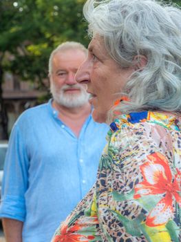 senior elegant man and fashionable lady