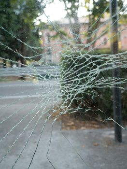 broken and cracked glass window