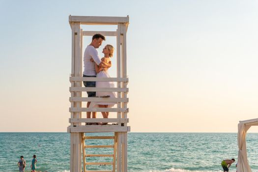 Love girl lifeguard tower guy pair paradise sunrise ocean safety, for sand saving in station from landscape holiday, iconic australia. Protect sun lifesaver,