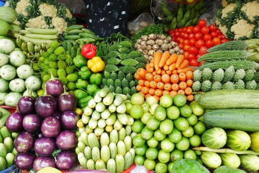 fresh vegetables selling at local market in dhaka .