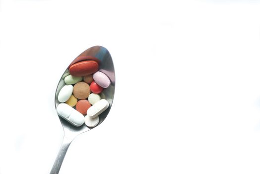 selective focus. Close up of many colorful pills and capsules .