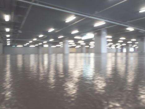 Focus blur of glossy flooring of the Parking lot in the parking building as background