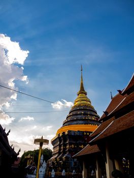 Northern Thai art patterns on various parts of the chapel and pagoda in the temple