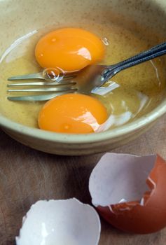 Crack the eggs into a bowl, prepare to make an omelet