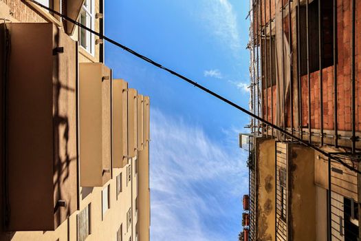 Rovigo, Italy 29 july 2022: Detail of Facade of an old brick tower block