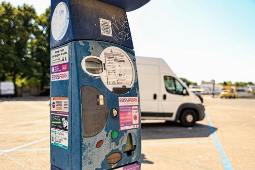 Rovigo, Italy 29 july 2022: Parking meter for paid parking