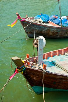 Small Wooden fishing boat coastal drift after returning from fishing