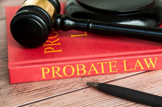 Judge gavel and Probate Law book on wooden desk. Law concept
