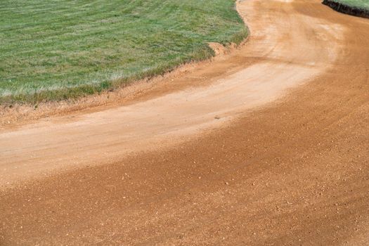 clay outdoor autocross track in nature.