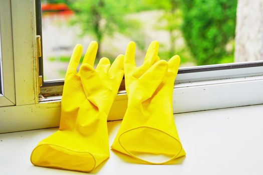 free from dirt, marks, or stains. Cleaning set. Sponges, white soap and yellow gloves.