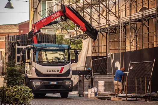 Rovigo, Italy 29 july 2022: Truck with crane street construction work