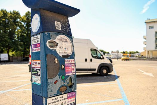 Rovigo, Italy 29 july 2022: Parking meter for paid parking