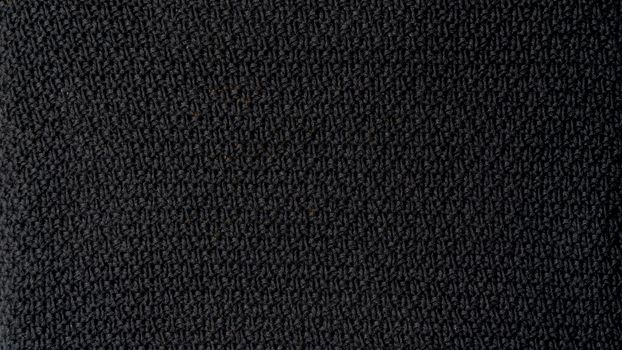 Dark background textile texture knitting weaving. High quality photo