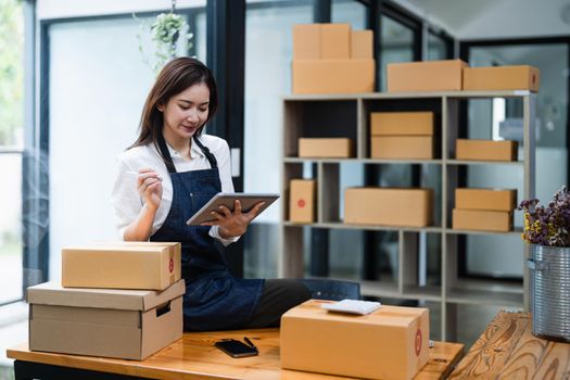 Small business aspiring entrepreneur, asian freelance worker working in a home office