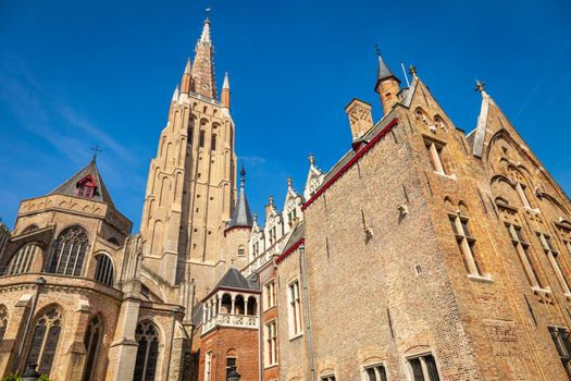 Church of our lady bell tower in Brugge at blue sky, Belgium