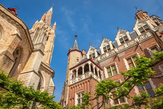Church of our lady bell tower in Brugge at blue sky, Belgium
