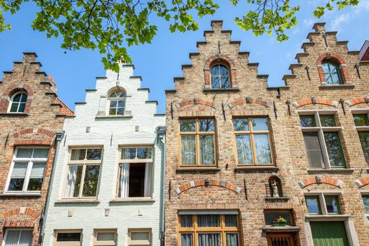 Bruges flemish architecture building facades at sunny day, Belgium