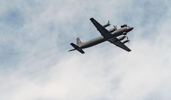 Russia, St. Petersburg, 28 July 2022: Military aircraft and helicopters of the air force fly on the city at the celebration of the Day of the Navy, amphibious and transport aircraft, anti-submarine. High quality photo