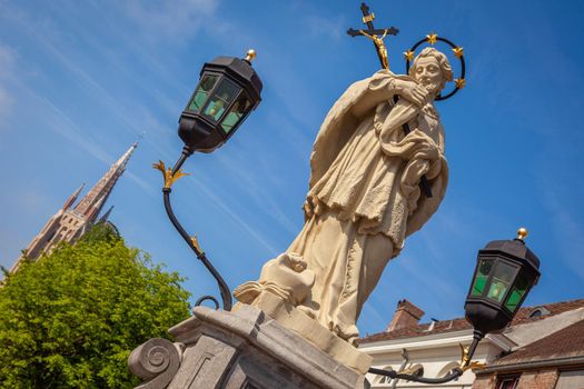 Statue of Saint Joannes Nepomucenus in Bruges and flemish architecture, Belgium