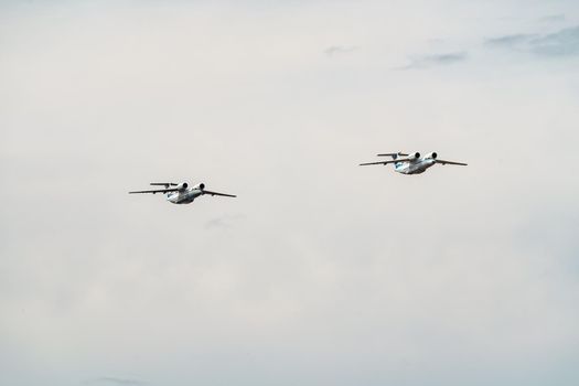 Russia, St. Petersburg, 28 July 2022: Military aircraft and helicopters of the air force fly on the city at the celebration of the Day of the Navy, amphibious and transport aircraft, anti-submarine. High quality photo