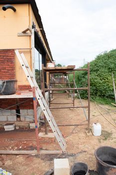 building a house supporting structure for laying bricks around a wooden base, a new House is being built, building materials, High quality photo