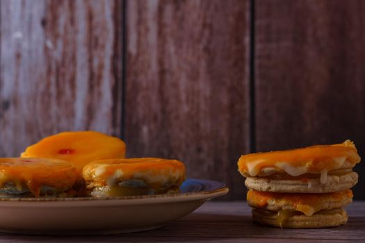 tortas locas, crazy cake typical from andalucia spain on a blue plate on a wooden background