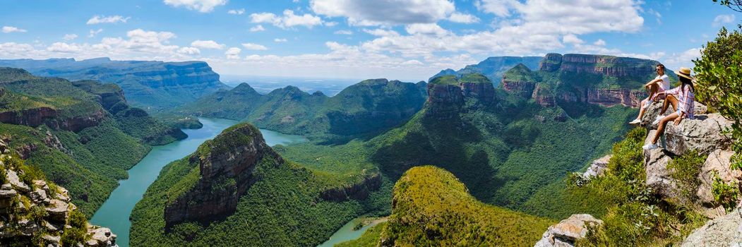 Panorama Route South Africa, Blyde river canyon with the three rondavels, view of three rondavels and the Blyde river canyon in South Africa. Asian women and Caucasian men visiting South Africa