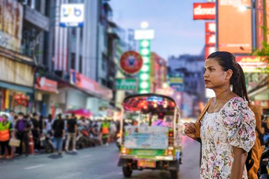 China town Bangkok Thailand, colorful streets of China Town Bangkok.Asian woman with bag, tourist visiting Chinatown