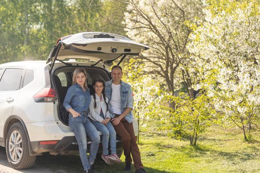 happy family enjoying road trip and summer vacation