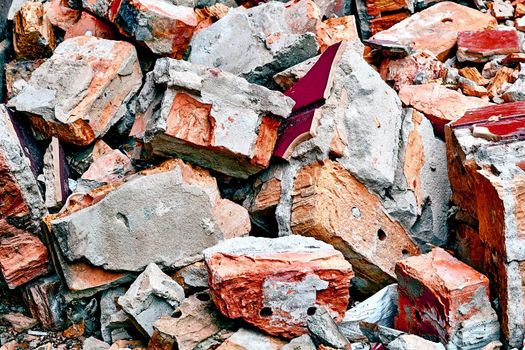 the action or process of causing so much damage to something that it no longer exists or cannot be repaired.After the disaster. A pile of red brick fragments left after the destruction.