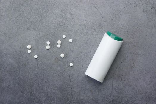 artificial sweetener container on black background ,