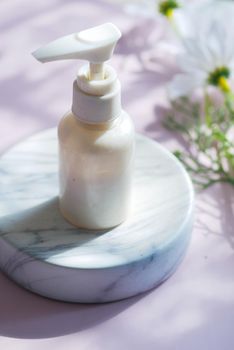 Close up of beauty cream in a container .